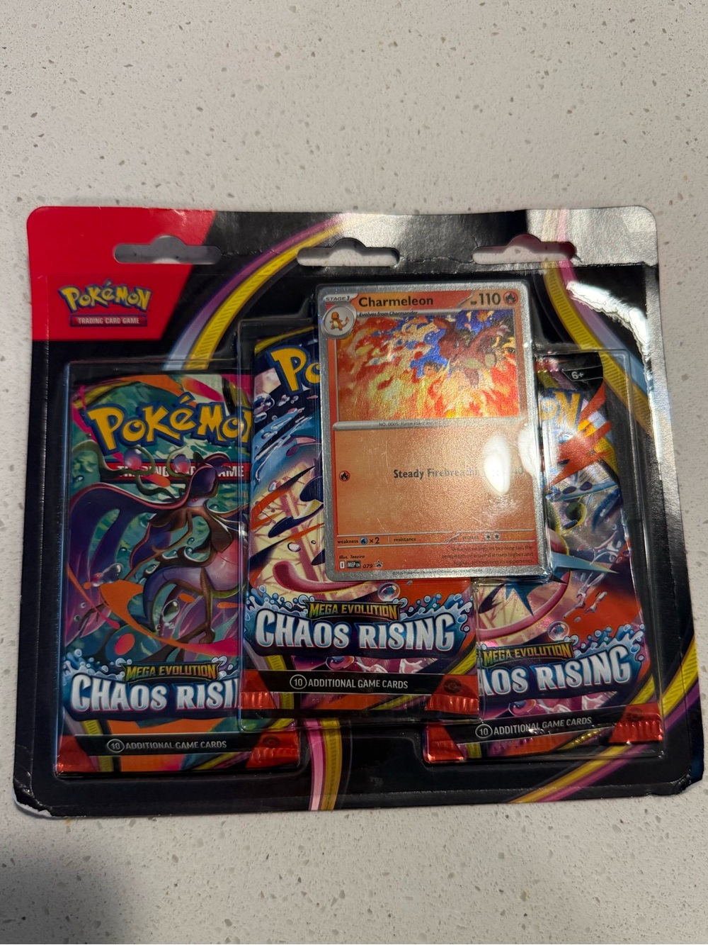 Pokemon Chaos Rising Booster Bundle with Orange Charmeleon Card and Blue Artwork